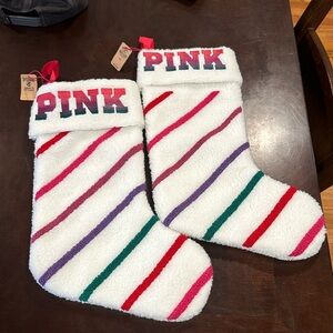 2 PINK Girls Christmas stockings. Brand new.Multi color.. nice for the holiday